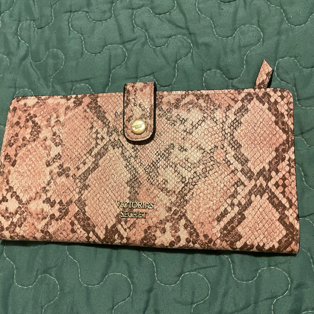 Women’s used pink snake skin look Victoria’s Secret wallet.